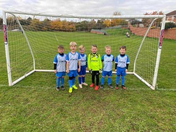 Adwick Park Rangers Under 6s show off their new strip sponsored by SYNETIQ.