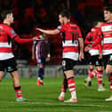 Luke Molyneux celebrates his goal with Tommy Rowe and Harrison Biggins. Picture: Andrew Roe/AHPIX LTD