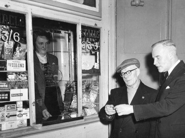 Paying for tickets at the Empire at ticket booth four - does this bring back fond memories?