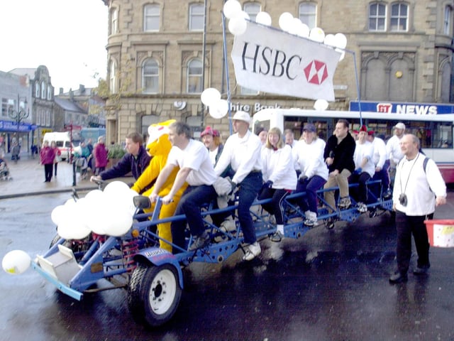 Members of the HSBC bank market Hill Barnsley set off on the worls largest bike as part of the children in need campaign in 2000