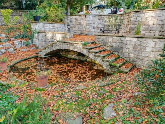 A pond feature within the gardens.