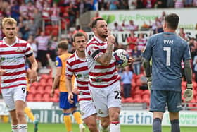 Lee Tomlin celebrates his one and only goal in a Doncaster Rovers shirt against Mansfield Town.