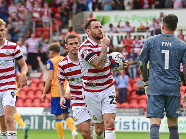 Lee Tomlin celebrates his one and only goal in a Doncaster Rovers shirt against Mansfield Town.