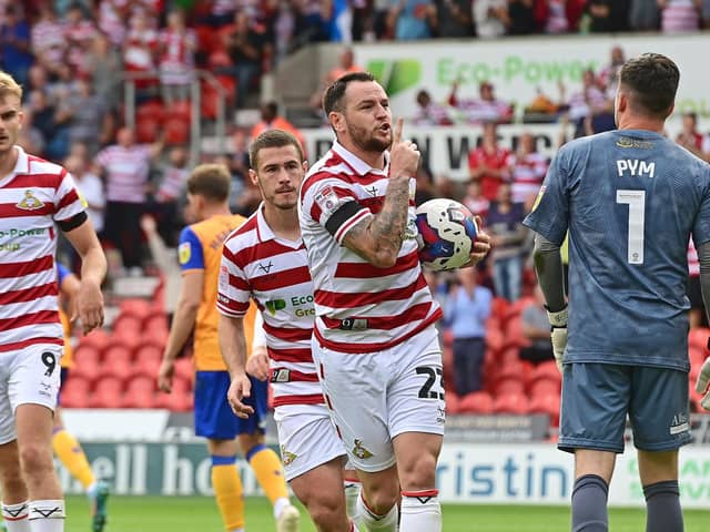 Lee Tomlin celebrates his one and only goal in a Doncaster Rovers shirt against Mansfield Town.