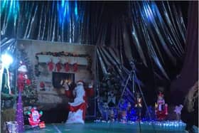 The Christmas market event featured a Santa 'covered in tattoos' as well as stalls 'full of tat' and traders standing in a 'muddy field.'