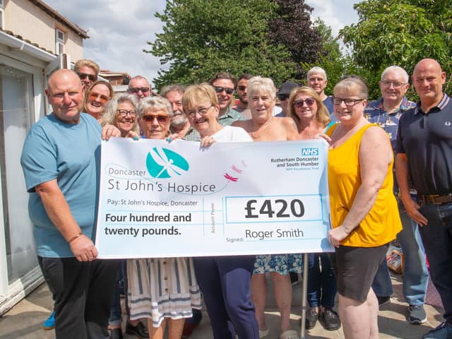 Roger is pictured together with family and friends who support his fundraising events.