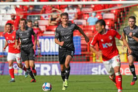 Joe Wright carries the ball out of defence. Picture: Gareth Williams/AHPIX