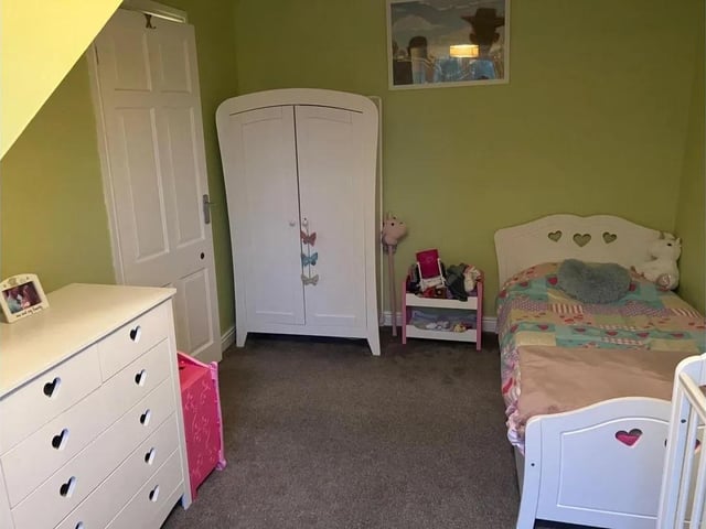 Another of the property's four bedrooms.