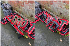 The wreaths were found dumped in an alleyway in Hyde Park.