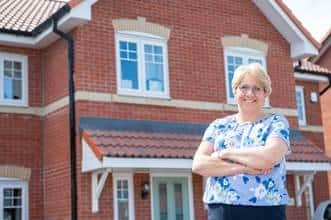 Barbara Clements outside her new home at Simpson Park