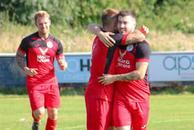 Matty Hughes is congratulated after scoring for Armthorpe. Photo: Steve Pennock