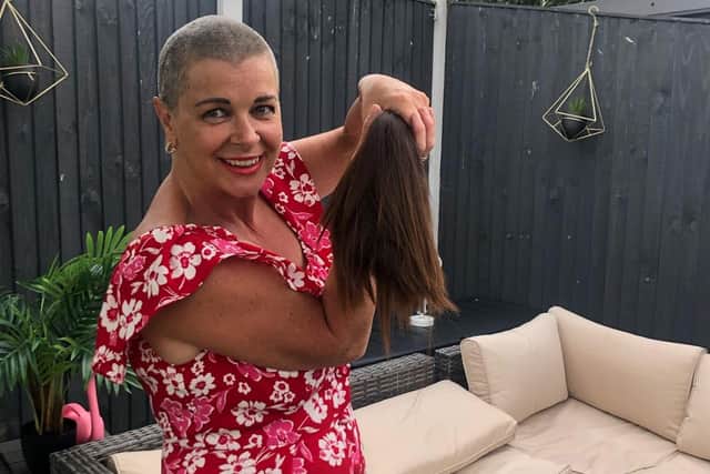 Newly shaved Denise after her charity hair cut
