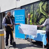 Volunteers from the Friends of Jubilee Park are pictured receiving the £200 from Co-op  manage Ellen Snook