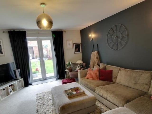The lounge has French doors out to the rear garden.