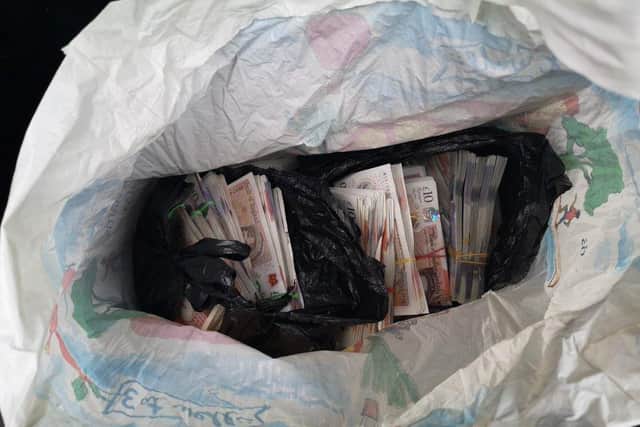 Police officers found a bag containing £60,000 in the boot of a car in Doncaster
