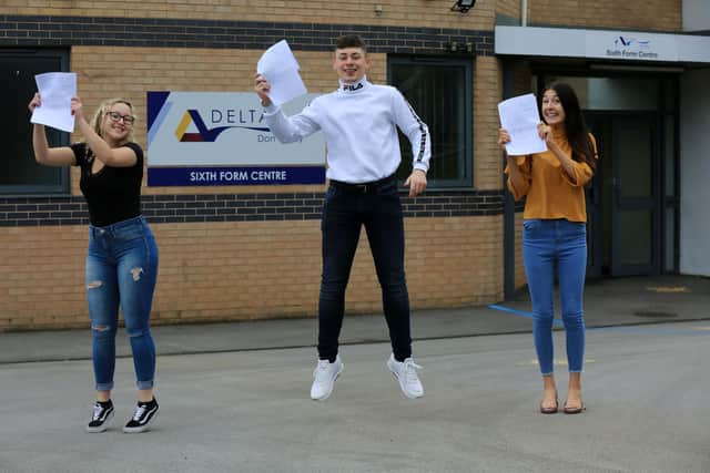 A-Level results day at Don Valley School, Jossey Lane, Scawthorpe. Pictured are Ellie-Anne Barker, Taylor Sheldon and Amie Scholes.