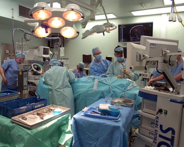 Thousands of patients have been on South Yorkshire hospital waiting lists for more than a year, as health bosses struggle to meet targets following the coronavirus pandemic. The picture shows an operation underway at the Hallamshire Hospital. Photo: Sarah Washbourn