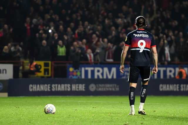 John Marquis approaches the penalty spot in the shootout with Charlton Athletic in the play-offs