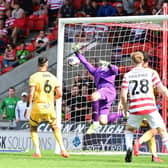 George Miller scores a late winner for Doncaster Rovers against Sutton with his first goal for the club.