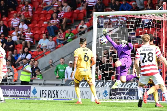 George Miller scores a late winner for Doncaster Rovers against Sutton with his first goal for the club.