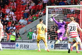 George Miller scores a late winner for Doncaster Rovers against Sutton with his first goal for the club.