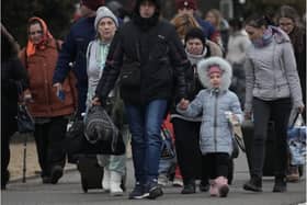Go Green is calling for more support for Ukraine refugees. (Photo: Getty).