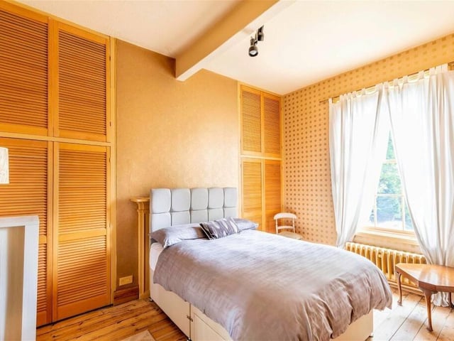 One of six bedrooms within the property.