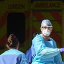 Doctors wearing protective equipment  (Photo by Peter Summers/Getty Images)