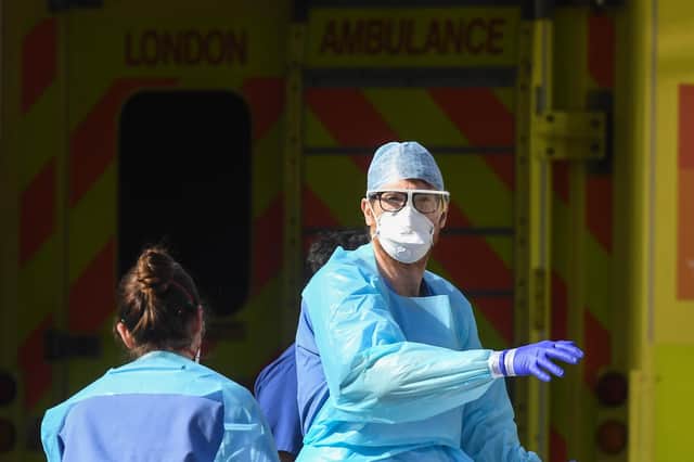 Doctors wearing protective equipment (Photo by Peter Summers/Getty Images)