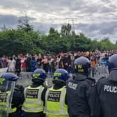 Doncaster man Luke Merritt was charged with beating an emergency worker at the riot in Wath.