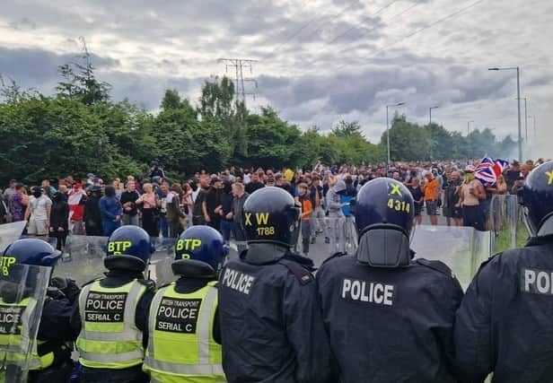 Doncaster man Luke Merritt was charged with beating an emergency worker at the riot in Wath.