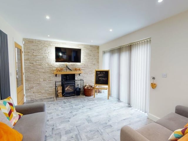 Space to relax, with access out to the patio and garden.