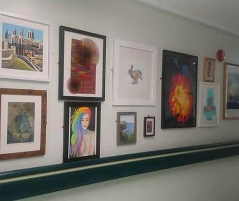 65 art pieces are now hanging in DRI.