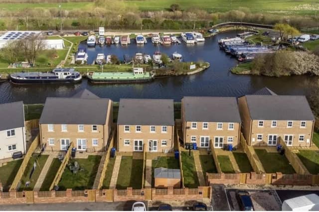 An overview of the property within its lovely surroundings that include the marina of the Stainforth and Keadby Canal.