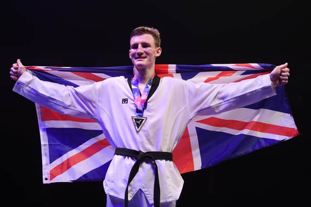First world title: Bradly Sinden of Great Britain celebrates with his Gold medal after victory against Javier Perez Polo of Spain in the Final of the Mens -68kg during Day 3 of the World Taekwondo Championships at Manchester Arena on May 17, 2019 (Picture: Laurence Griffiths/Getty Images)