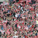 Doncaster Rovers fans celebrate victory over Leeds United in the League One play-off final at Wembley