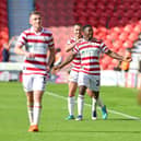 Doncaster's Kieran Agard celebrates his winning goal against Sutton United.