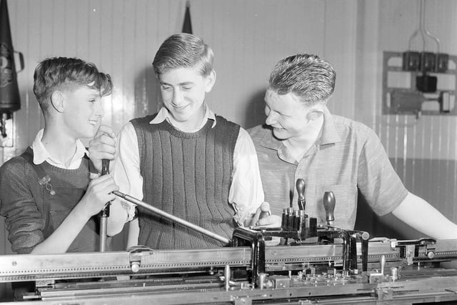 Turner Rutherford Ltd knitwear factory - three apprentices at hardknitting machine, June 1958.