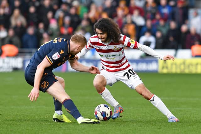Doncaster's Todd Miller on the attack against Bradford City.