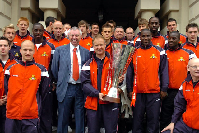 Rovers manager Sean O'Driscoll, chairman John Ryan and the Rovers squad are pictured with the Johnstone's Paint Trophy.