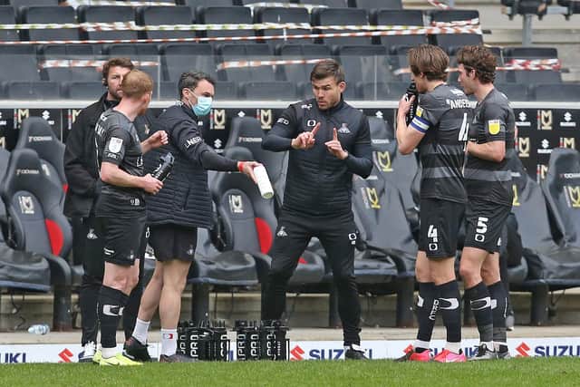 Andy Butler speaks to his players