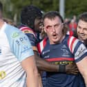 ohn Kelly celebrates his second try against Bedford Blues.
