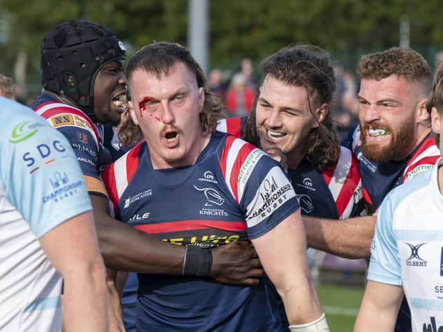 ohn Kelly celebrates his second try against Bedford Blues.