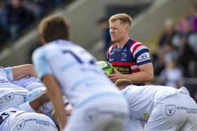Calling the shots: Doncaster Knights' scrum-half Alex Dolly lines up at a scrum having turned to rugby union after arriving in England from Australia as a cricketer.