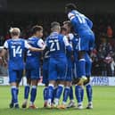 Rovers celebrate their goal at Scunthorpe United