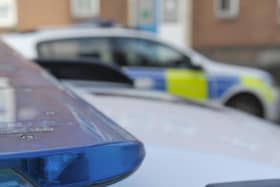 File picture shows police cars. Emergency services were called after a body was found in Dunscroft, Doncaster