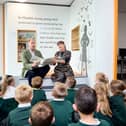 HRH Prince Edward reads to pupils from Hill Top Academy in Edlington on his visit to the Danum Gallery, Library and Museum in Doncaster