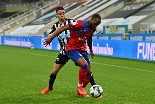 Miguel Almiron of Newcastle United and Ryan Nyambe of Blackburn Rovers  battle for the ball.
