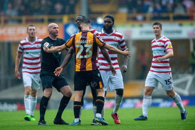 Doncaster Rovers defender Joseph Olowu in the thick of the action at Bradford City. Picture Bruce Rollinson
