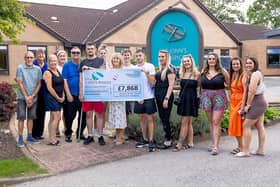 Brandon Burke (sixth from the right) is pictured with St John’s Hospice Fundraiser Tracey Gaughan (centre), with friends and family who have supported his fundraising in memory of his fiancée Melissa Mountford.